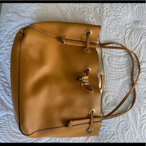 Orange Zara purse with drawstring closure